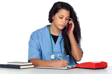 Young medical student with a phone