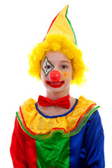 portrait of child dressed as colorful funny clown