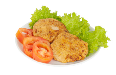 patties on a plate with lettuce leaves