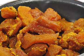 marinated  meat in a pan