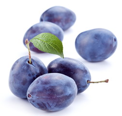 Plums isolated on white background