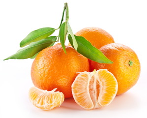 Tangerines with leaves on white background.