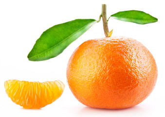 Tangerine with leaves and its slice on white background.
