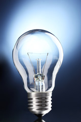 Light bulb on blue background