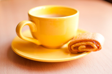 Coffee in an yellow cup