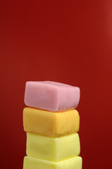 Juicy Fruit Chewy Sweets on Red Background