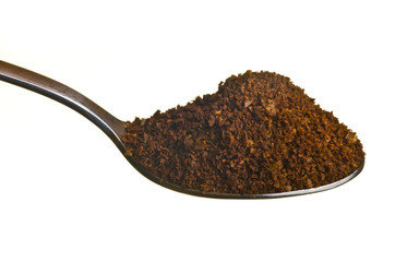 Coffee ground in a spoon