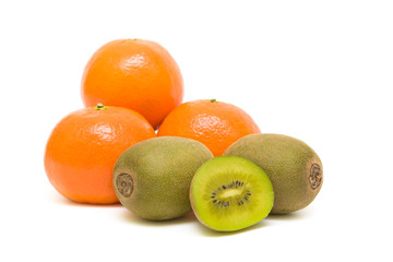 kiwi and tangerine on white background close-up