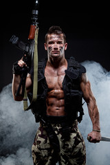 Muscular young sexy naked soldiers with knife © IgorKireev