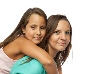 Little girl embracing her mother