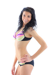 brunette attractive woman in swimsuit on white background
