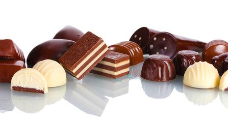 Many different chocolate candy isolated on white