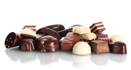 Many different chocolate candy isolated on white