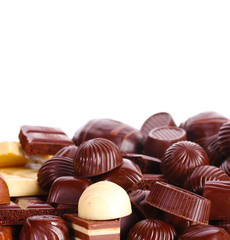 Many different chocolate candy isolated on white