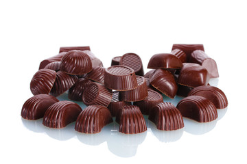 Many different chocolate candy isolated on white