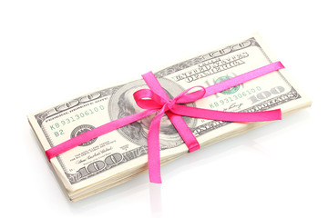 A lot of one hundred dollar bills tied pink ribbon isolated