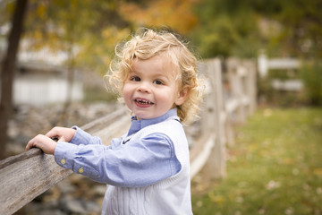 Adorable Young Boy Playing Outside