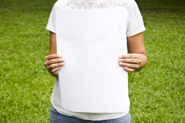 woman holding a blank board