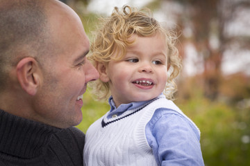 Fototapeta premium Handsome Father and Son in the Park