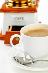 Coffee in white cup with coffee