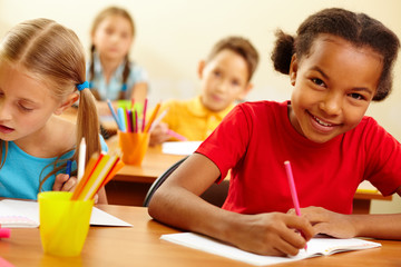 Classmates at drawing lesson