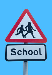 school warning sign on blue sky background