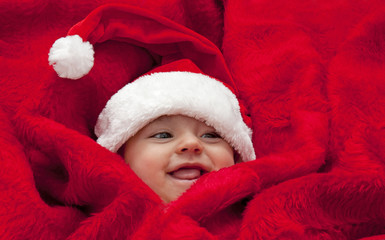 little baby boy in santa claus hat
