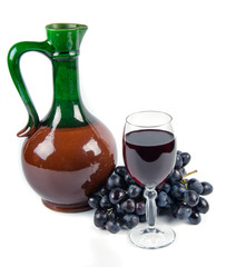 old ceramic decanter and glass with wine