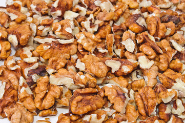 pile of walnuts nuts broken