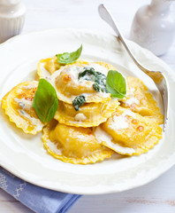 Panzerotti with blue cheese sauce and spinach