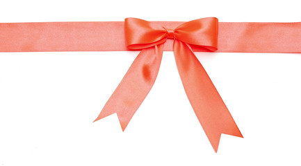 Red ribbon with bow on white