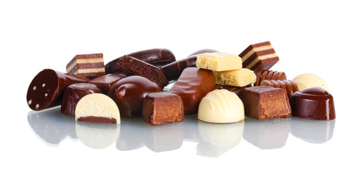 Many different chocolate candy isolated on white