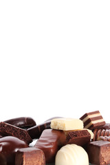 Many different chocolate candy isolated on white