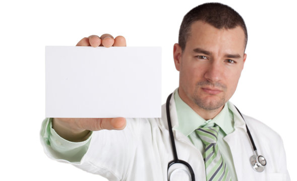 Doctor holding blank card