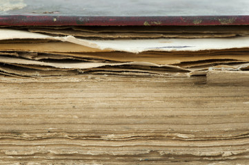 Old worn paper sheets of book