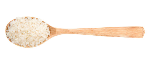 rice grain in wooden spoon