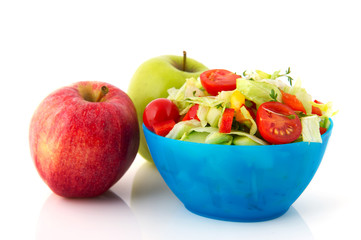 Fresh mixed salad and apples