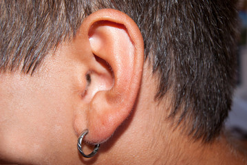 Ear of an adult male close-up