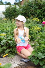 Girl gardening in the summer