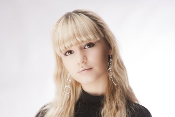 Naklejka premium beautiful young girl over white background