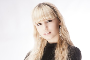 Fototapeta premium beautiful young girl over white background