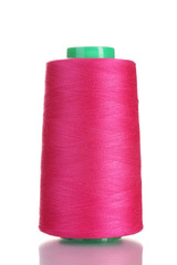 Pink bobbin thread isolated on white