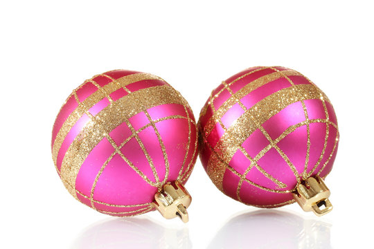 beautiful pink Christmas balls isolated on white
