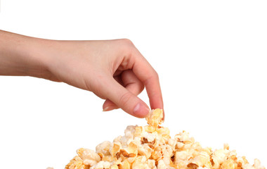 hand picking a tasty popcorn