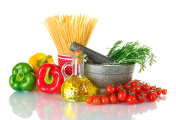 spaghetti in cup, rosemary in mortar, oil in jar paprika,