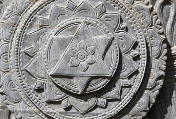 Stone sculpture of mandala