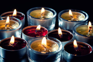 Close-up of burning tea light candles
