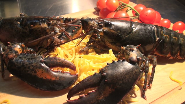 exhibition of live lobster with cooking element