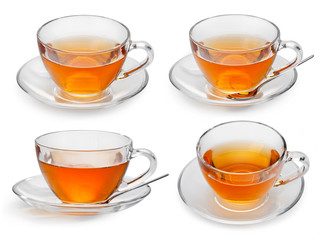 Set of cups with tea isolated on white background.
