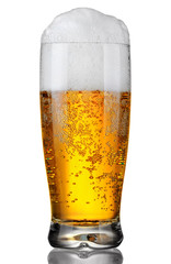 glass of beer with froth over white background